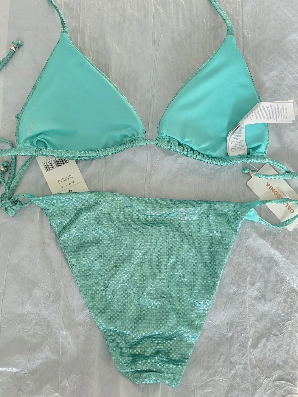 Calzedonia teal triangle